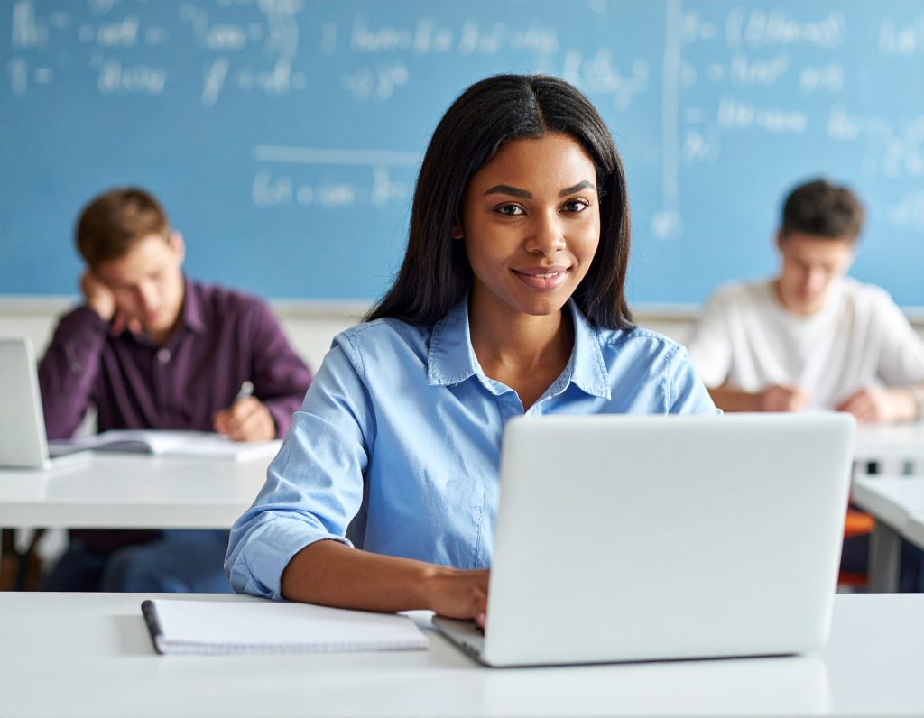 Firefly Handsome Young African American Skin Female Taking Physics Exam With A Laptop With Ma 272251 1024x796