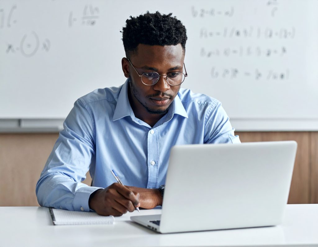 Firefly Handsome Young Light Skinned Dark Male Taking Physics Exam With A Laptop With Many Ma 272251 1024x796